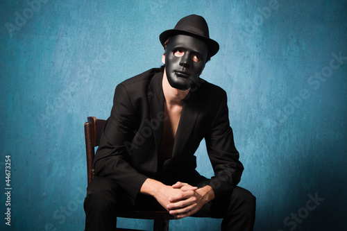 man with black mask