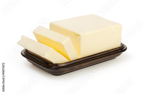Butter on butterdish isolated on white with clipping path