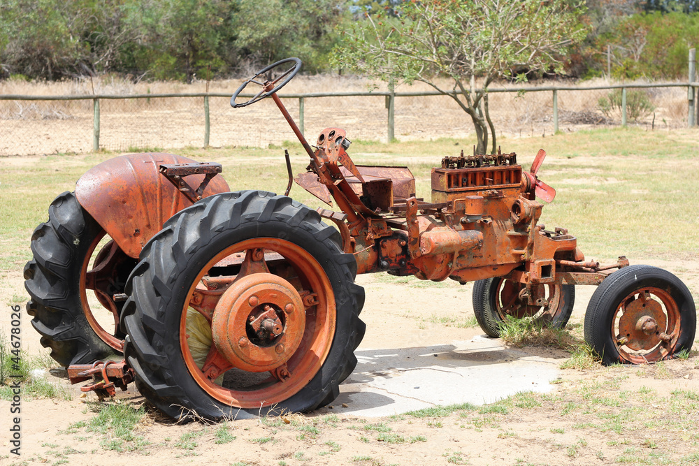 Very old red tractor