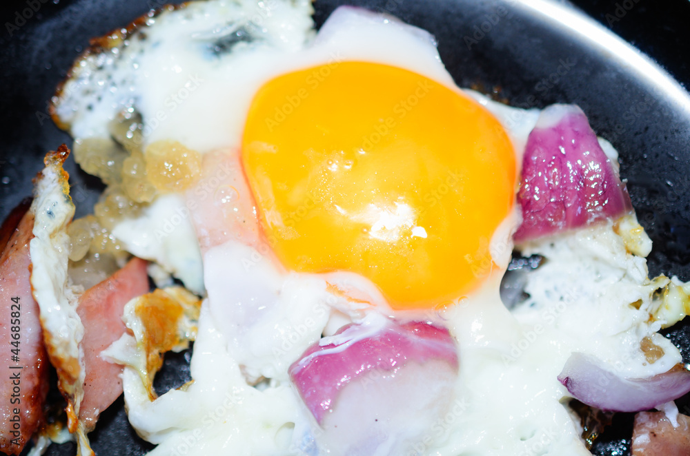 Fried egg with onion and sausage Fried egg with onion and sausage