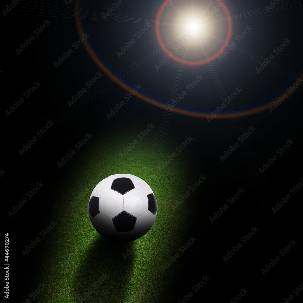 Naklejka premium soccer ball under light