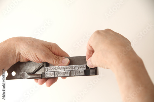 using composing stick to set type