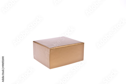 Golden paper box isolated on white background