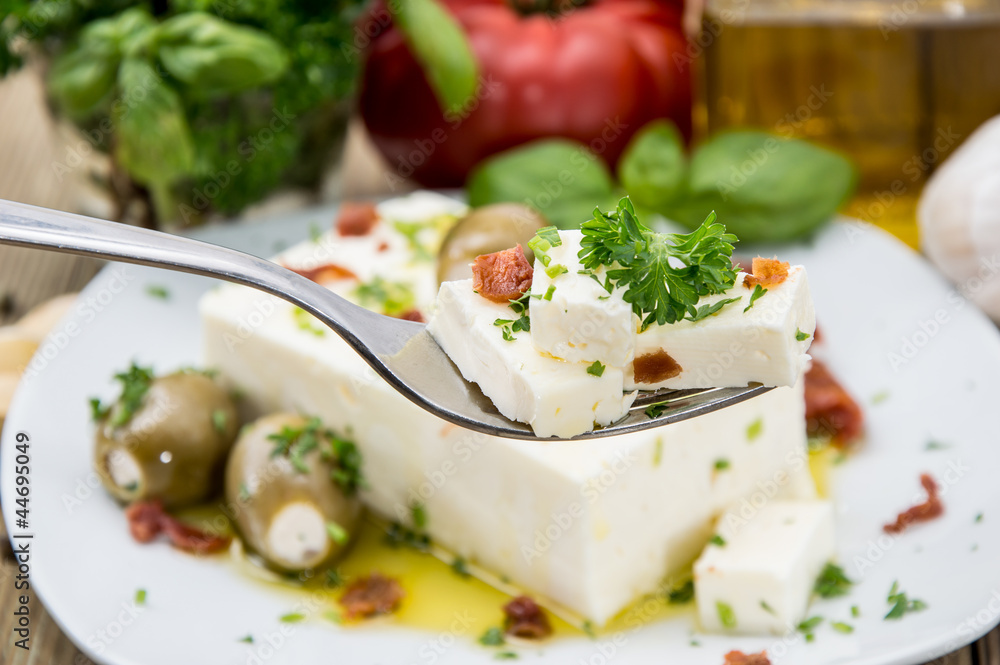 Fork with Feta and portion in the back Fork with Feta and portion in the back