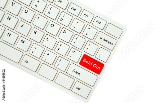 Wording Sold Out on computer keyboard isolated on white backgrou