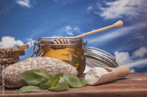 Baking goods and vegetalbes with sky background photo