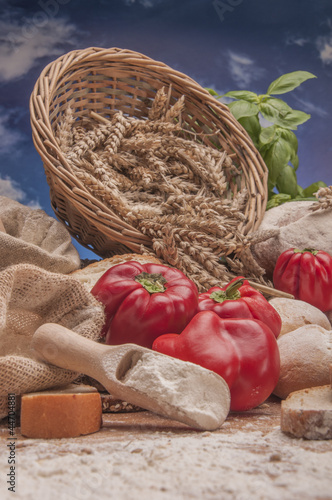 Loaves of bread, rolls and vegetalbes photo