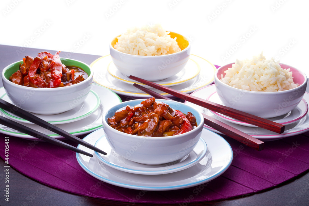 Chinese bowls with rice and sweet and sour chicken Chinese bowls with rice and sweet and sour chicken