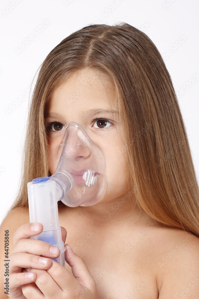 Child with inhaler Child with inhaler
