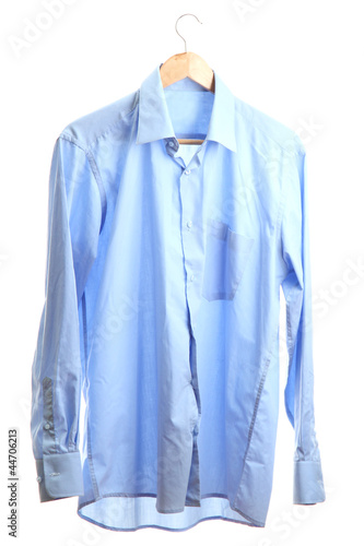 blue shirt on wooden hanger isolated on white
