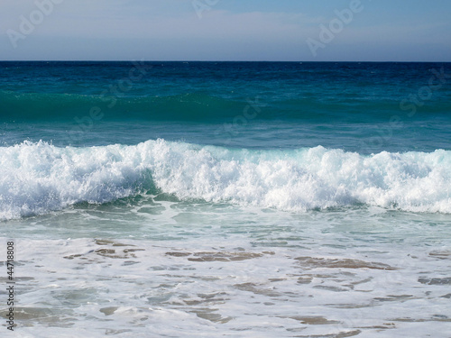 Beautiful landscape with waves breaking on shore