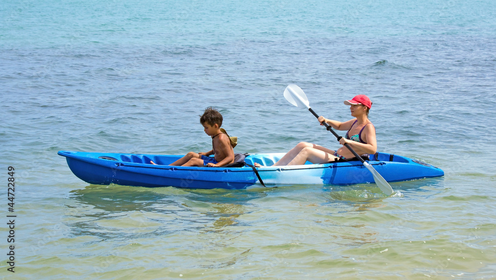 Mother and son kayaking