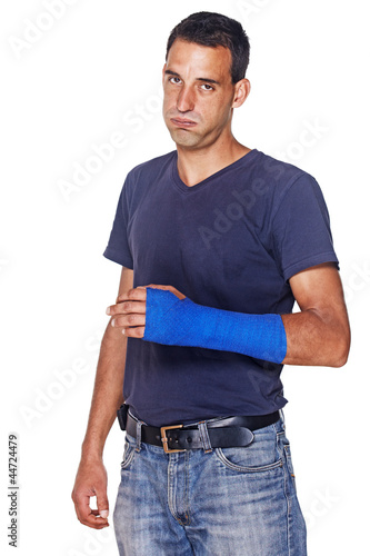 man with blue arm bandage