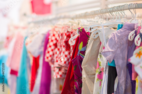 Variety of shirts, trousers, dresses in kids mall