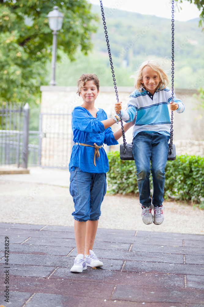 Children Playing on the Swing