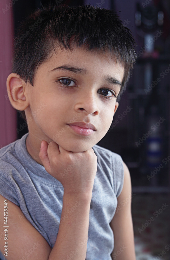 Indian Little Boy Posing to Camera Stock Photo