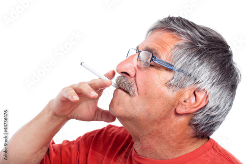 Senior man smoking cigarette