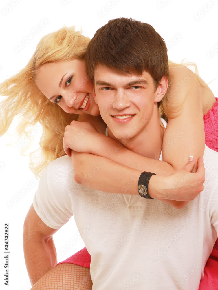 A young loving couple, isolated on white A young loving couple, isolated on white