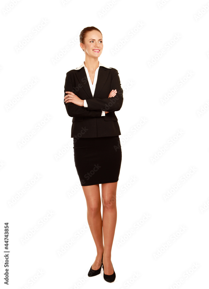 A beautiful woman standing with her arms crossed A beautiful woman standing with her arms crossed