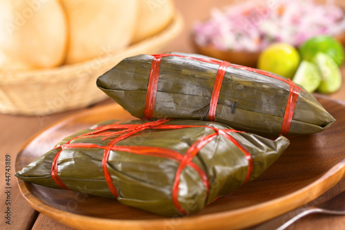 Obraz na plátně Peruvian tamales wrapped in banana leaves