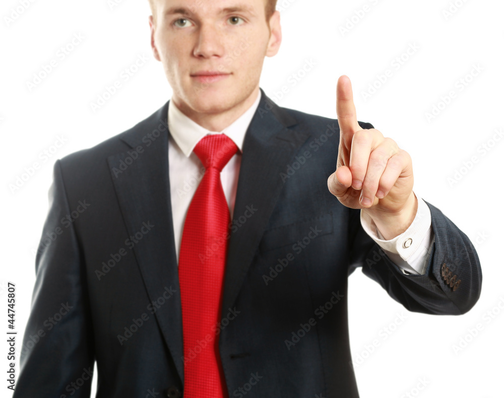 A young man pointing something isolated on white background A young man pointing something isolated on white background