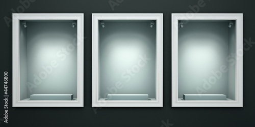Three empty showcases of the shop
