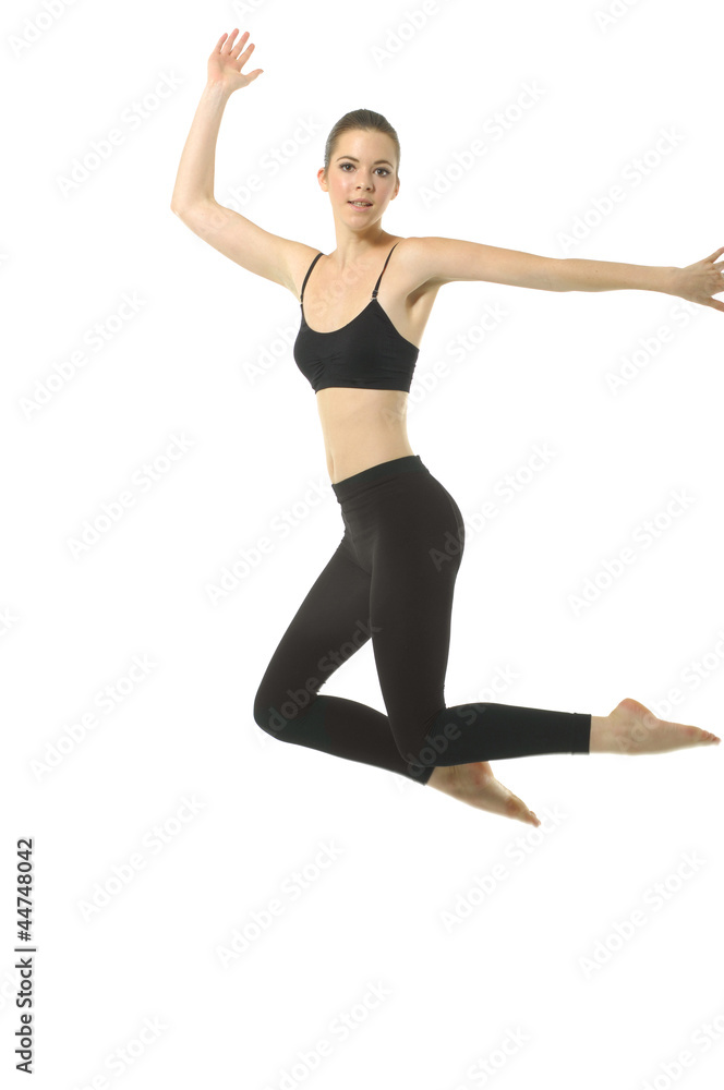 girl in black sportwear jumping