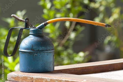 Oil Gun on the backyard background