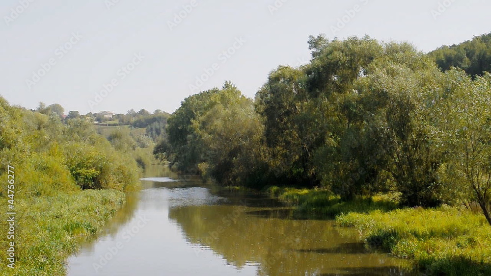 River flows through the trees on banks River flows through the trees on banks