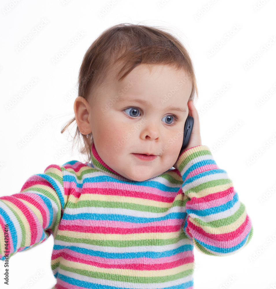 Baby girl talking on mobile phone Baby girl talking on mobile phone