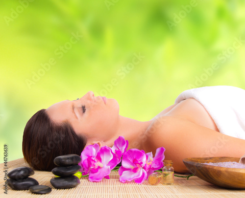 Beautiful woman relaxing in spa