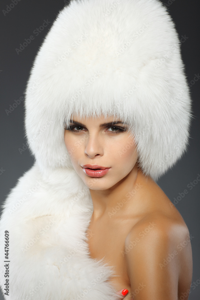 A photo of sexual beautiful girl is in fur clothes A photo of sexual beautiful girl is in fur clothes