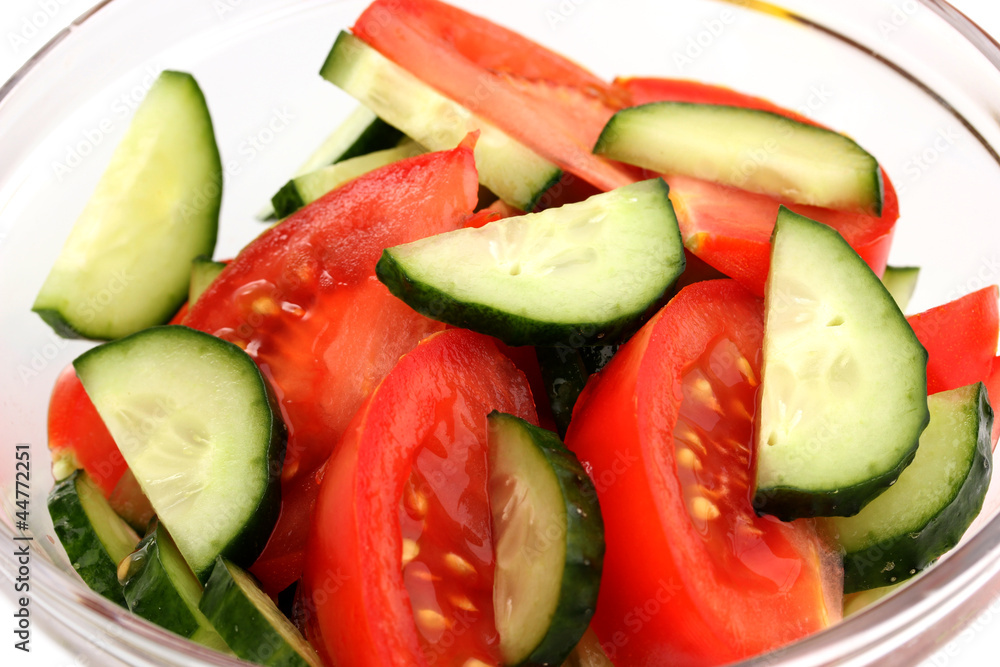 Fresh salad with tomatoes and cucumbers close-up Fresh salad with tomatoes and cucumbers close-up