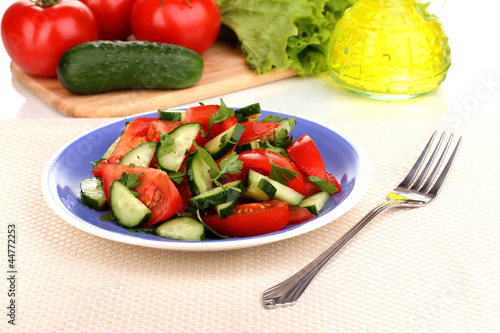 Fresh salad with tomatoes and cucumbers © Africa Studio