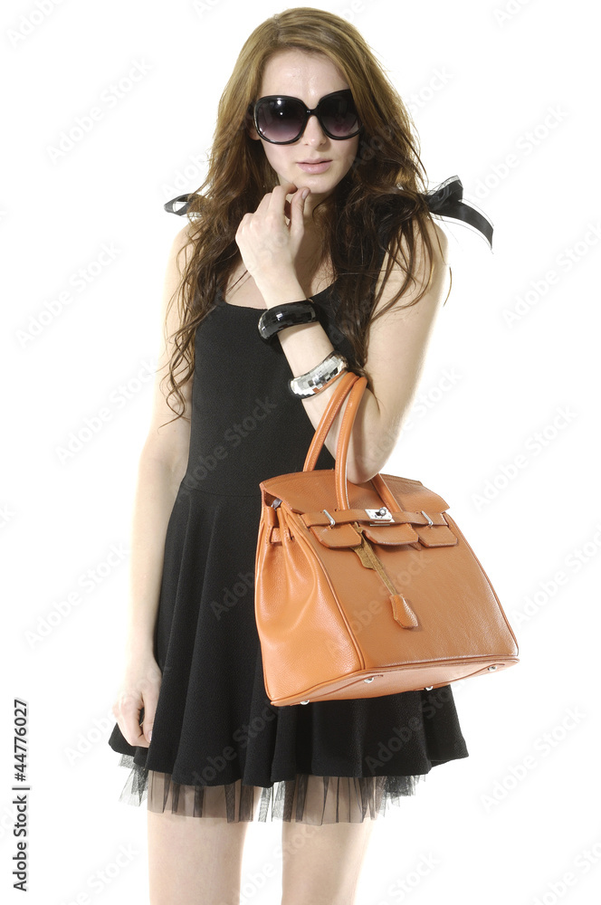 fashion sexy woman in sunglasses, posing with handbag fashion sexy woman in sunglasses, posing with handbag