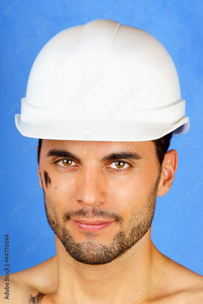 Dirty manual worker with hard hat Dirty manual worker with hard hat