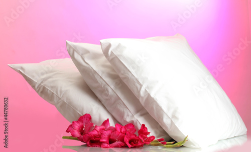 pillows and flower, on pink background