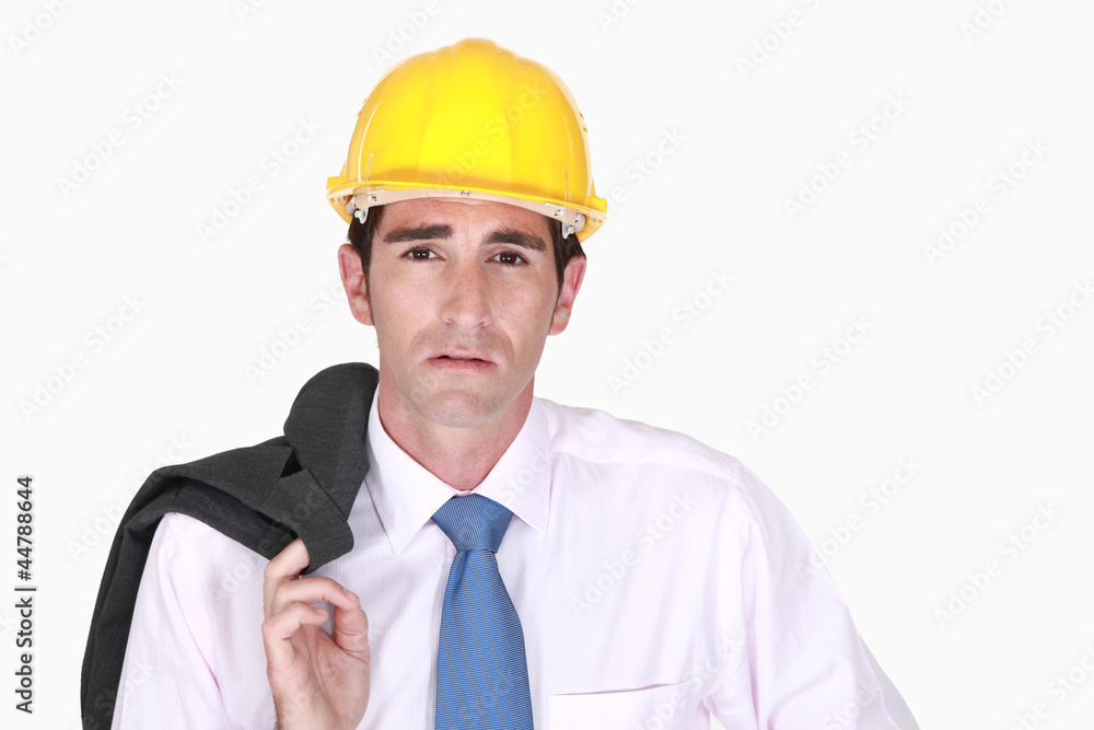Engineer with his jacket over his shoulder Engineer with his jacket over his shoulder