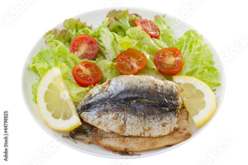 fried fillet of sardines with salad