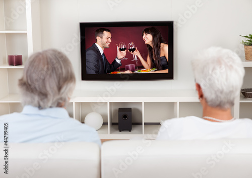Couple watching romantic television