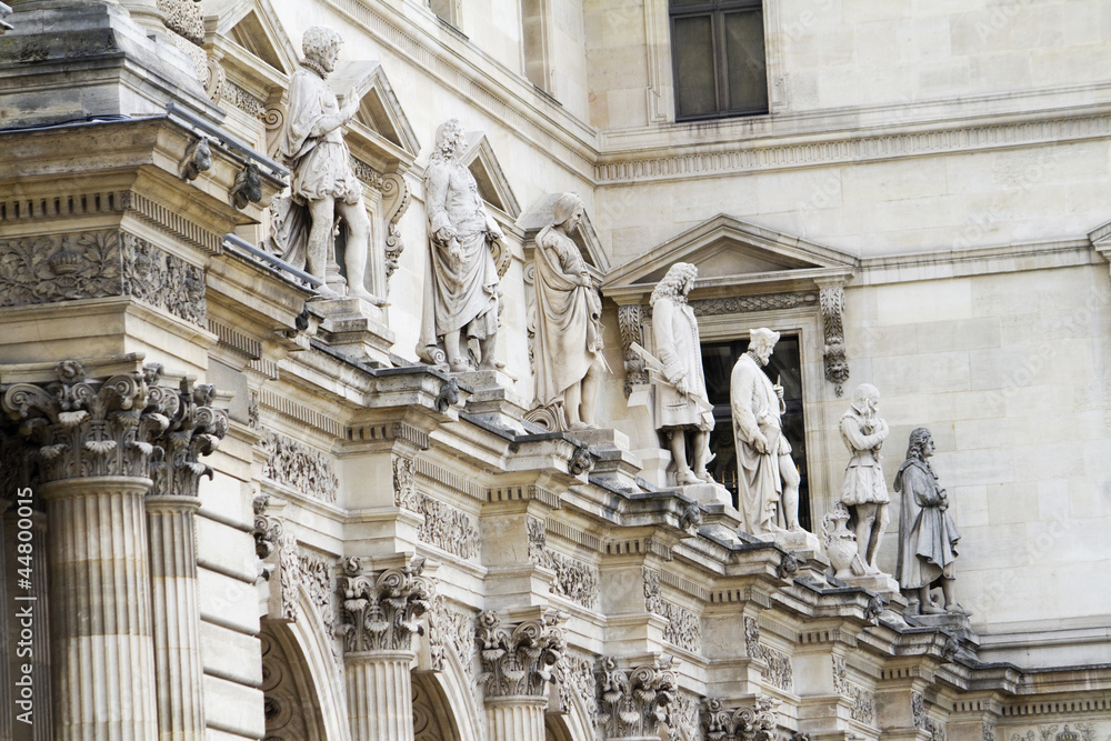 beautiful statues located on the Museum of the Louvre