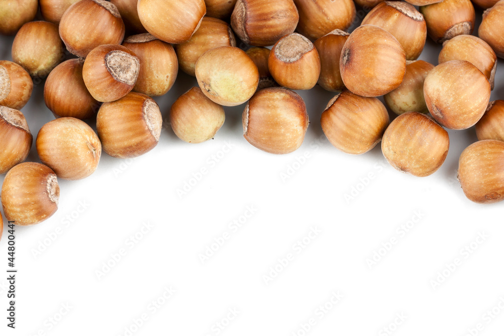 Hazelnuts pile isolated on white background Hazelnuts pile isolated on white background
