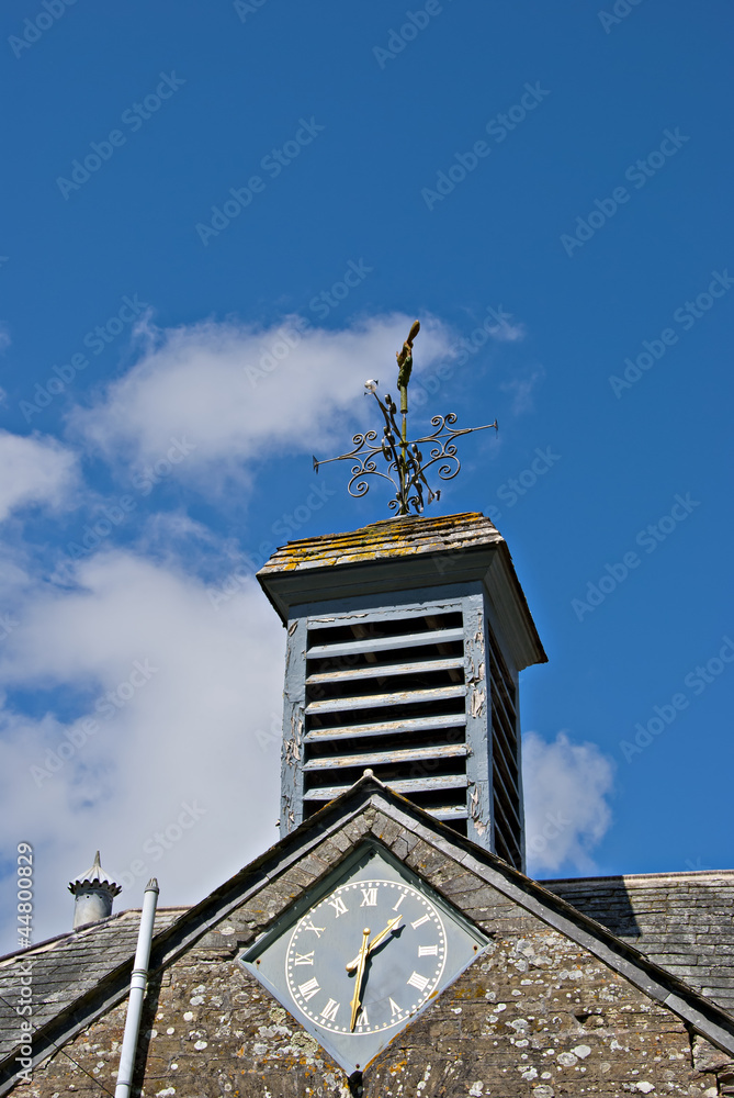 A Running Fox Weathervane and Clocktower