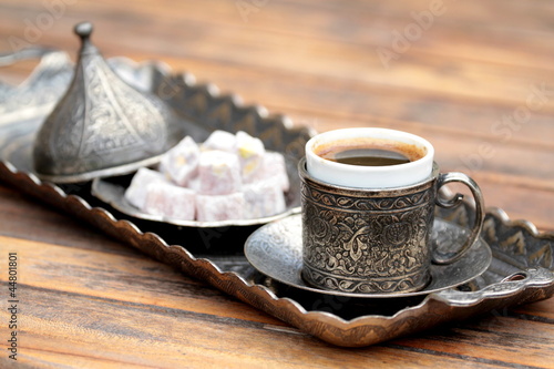 Turkish coffee and turkish delight with traditional cup and tray