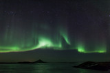 Northern lights over frozen lake Myvatn in Iceland