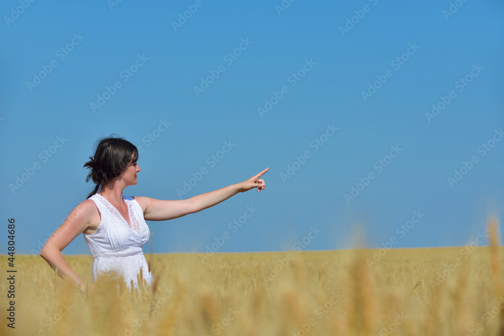 young woman in wheat field at summer young woman in wheat field at summer