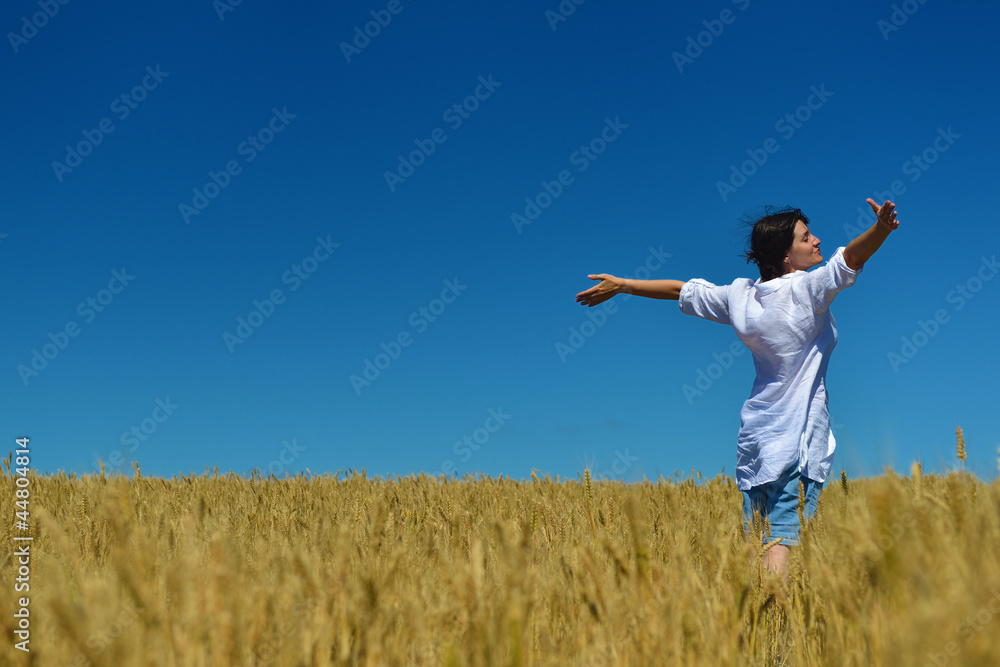 young woman in wheat field at summer young woman in wheat field at summer