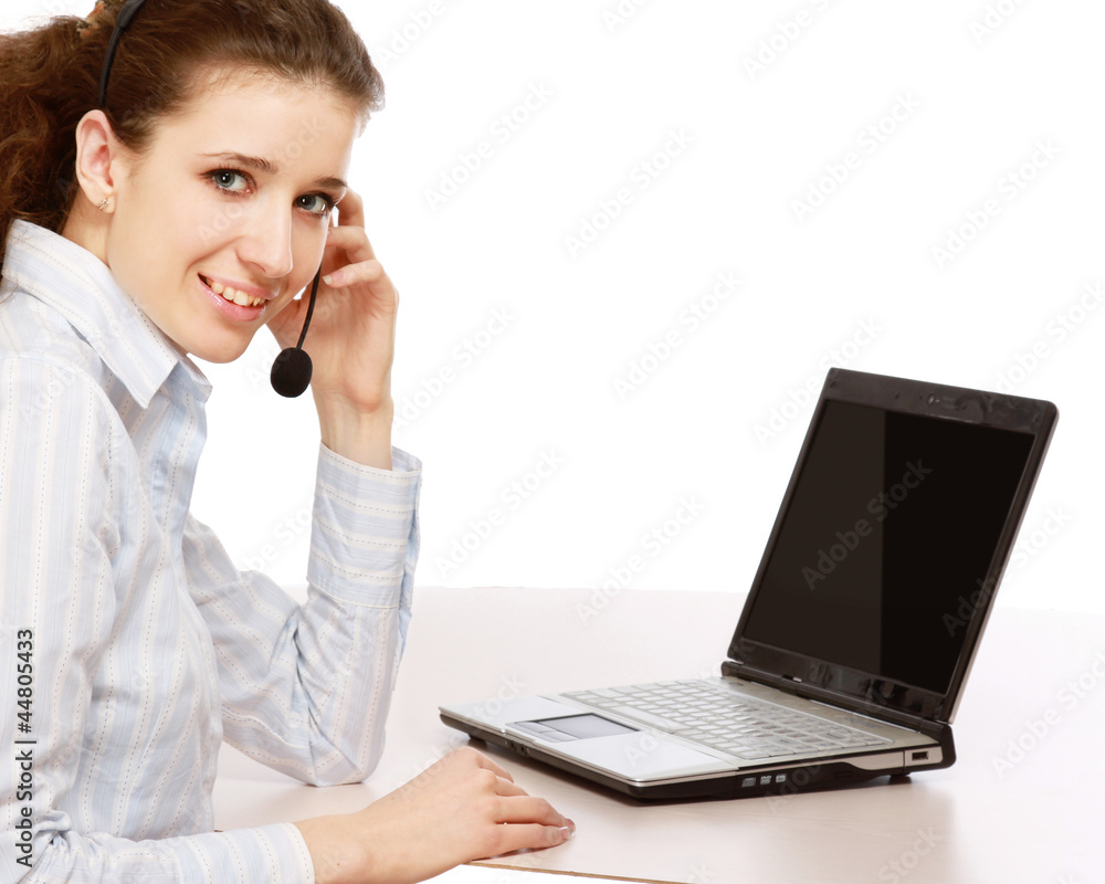 A smiling young customer service girl with a headset A smiling young customer service girl with a headset
