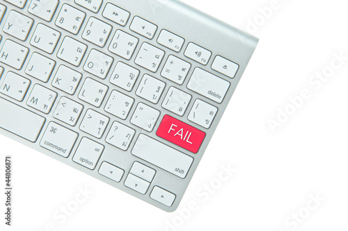 Red fail button on computer keyboard isolated on white backgroun