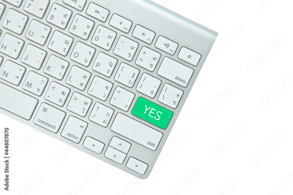 Green yes button on computer keyboard isolated on white backgrou Green yes button on computer keyboard isolated on white backgrou
